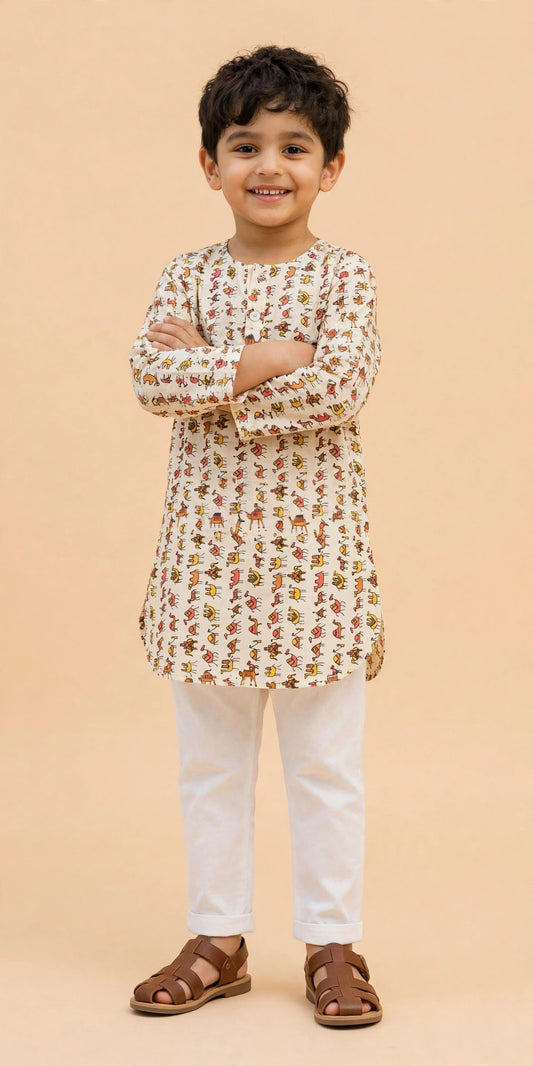 Boys cream camel print kurta pajama set with arms crossed