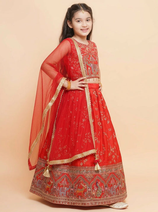 Side view of girls red embroidered lehenga with flowing dupatta