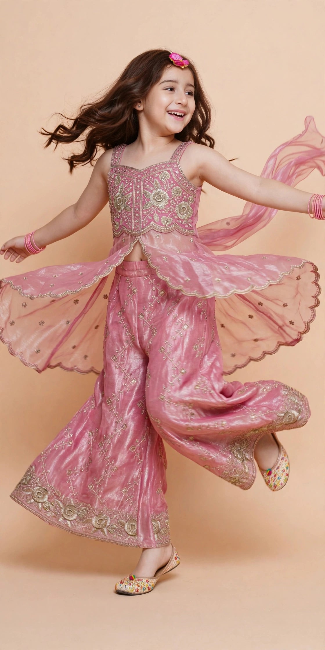 Side view of dusty pink palazzo set with scalloped sheer kurti panels and dupatta