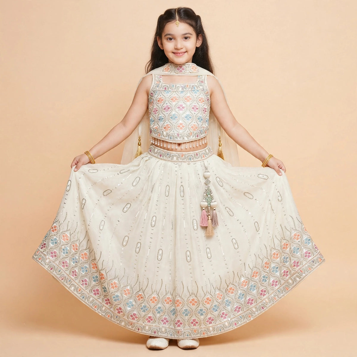 Ivory floral lehenga choli shown with sleeves stitched on