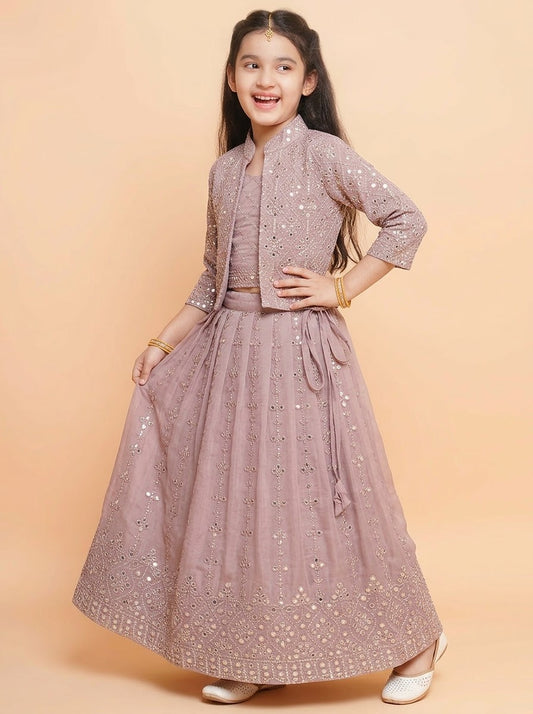 Front view of girls mauve embellished lehenga choli with cropped jacket