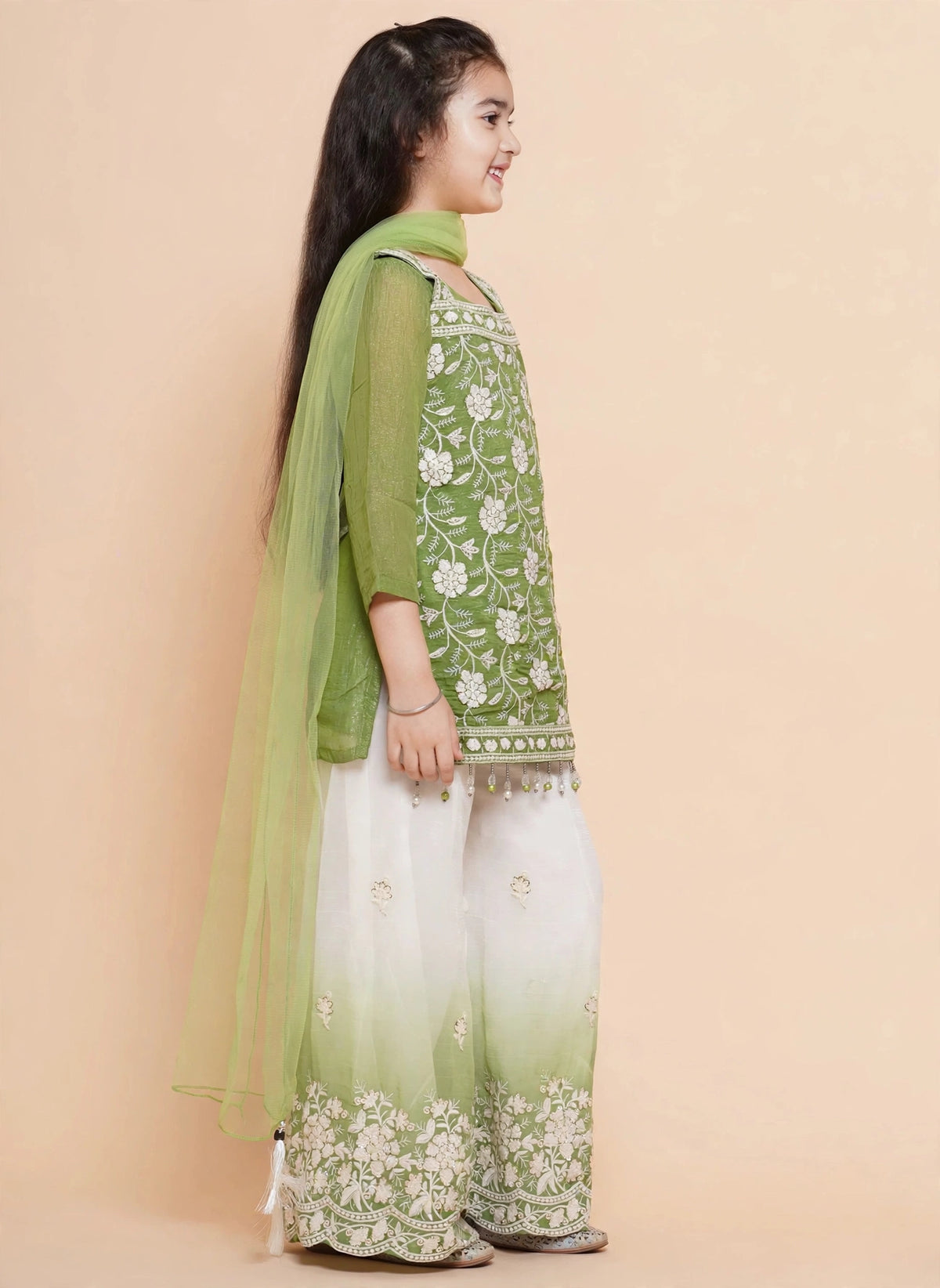 Front view of sleeveless green floral kurti with pearl-drop hem and sheer dupatta