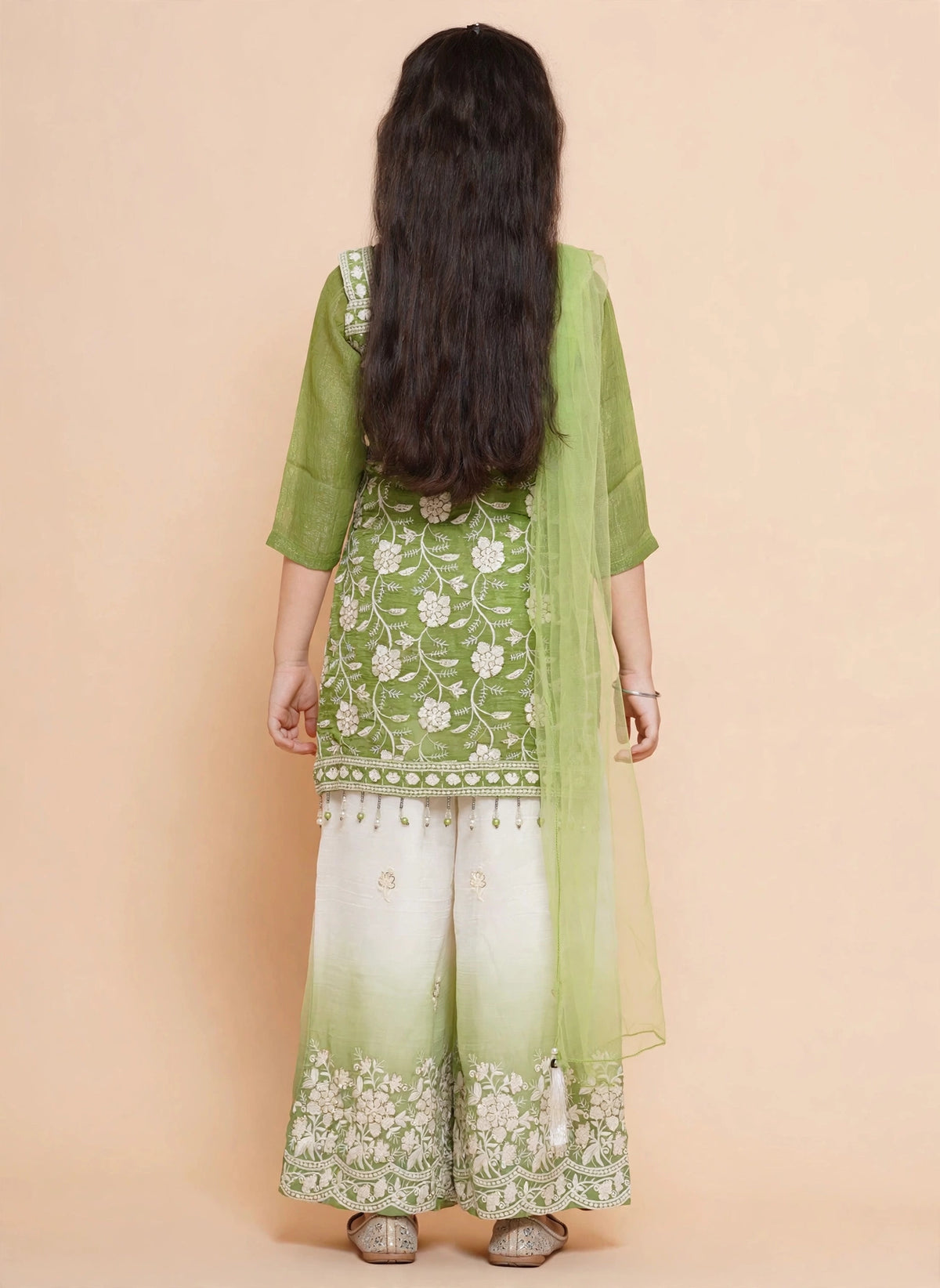 Front view of girls leaf green embroidered kurti with ivory-to-green ombre palazzo pants and dupatta