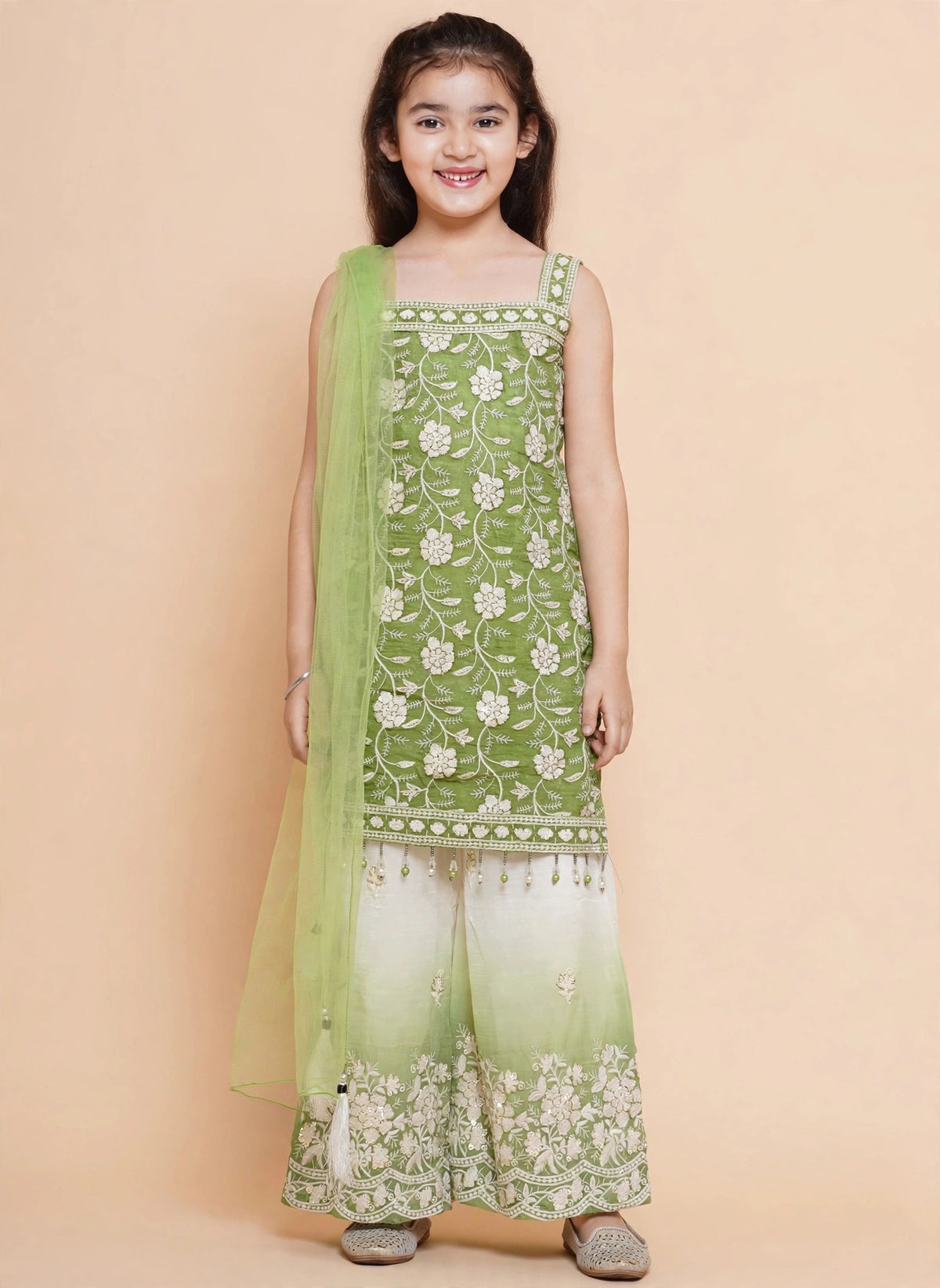 Side view of sleeveless leaf green floral kurti and ombre palazzo pants