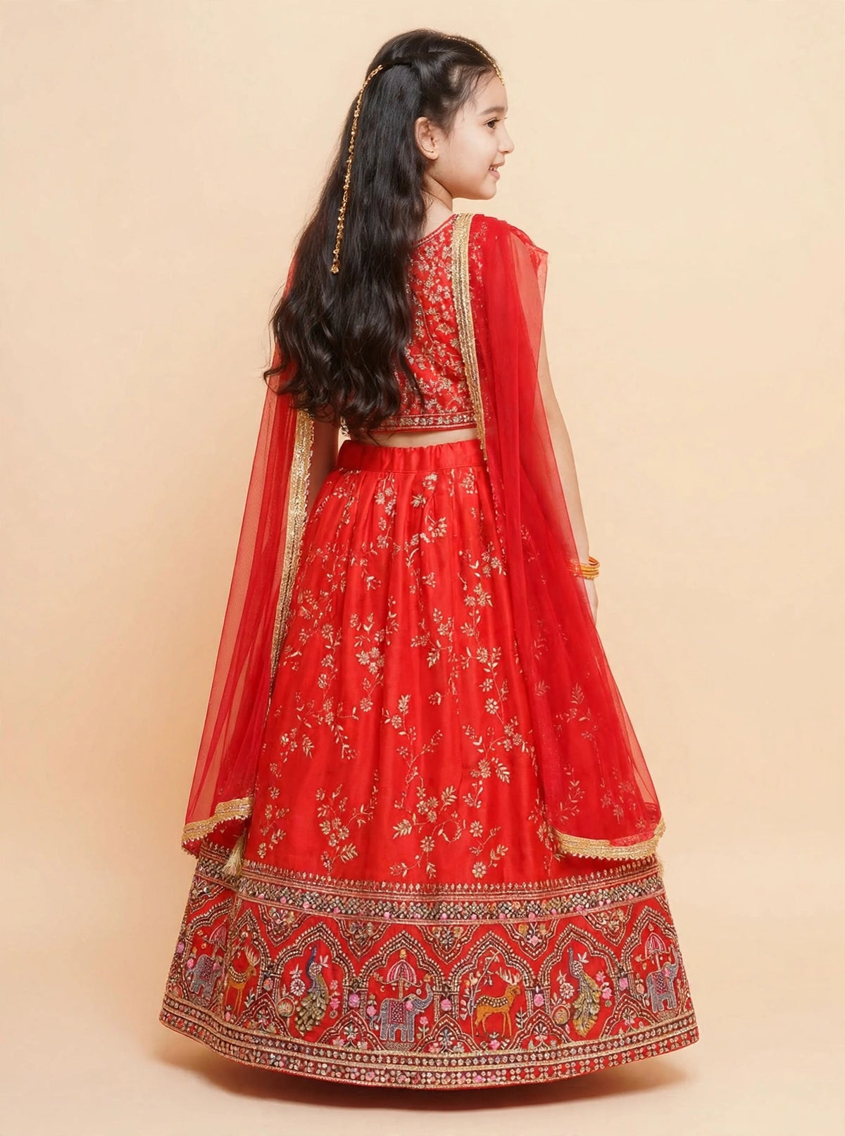 Girls red wedding lehenga with gold-tone floral detailing and dupatta
